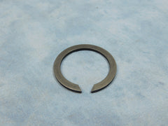 INPUT BEARING RETAINING CLIP FOR 2.5 TON MANUAL TRANSMISSIONS.  SEE #1 IN THE DIAGRAM.  I CAN LOCATE JUST ABOUT ANY TRANSMISSION INTERNAL ITEM YOU MAY NEED. EMAIL ME IF THERE IS OTHER TRANS PARTS YOU ARE LOOKING FOR THAT I DO NOT HAVE LISTED HERE.  PART # 7520993 NSN 5325-00-508-4675, 5365005084675, 914363, 2339T2, 21-381-1
