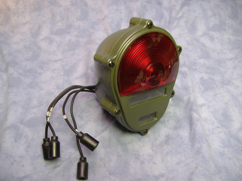 24 VOLT MILITARY TAIL LIGHT COMPOSITE TAIL LIGHT M35A2, M35A3, M109A3 M54, M813, M816, M818 M923 M925 M931 M939 M998,M151 M52 M62 M543 M246 M51 M39  11614157, alternate numbers 3454000, MS52125-2, SW27006-3. 
NSN 6220010934439
BIG MIKE SURPLUS BIG MILES SURPLUS BIG MIKES MOTOR POOL BIG MIKE;'S MOTOR POOL BIG MIKE'S MOTORPOOL BIG MIKE ARMY TRUCK PARTS
.
